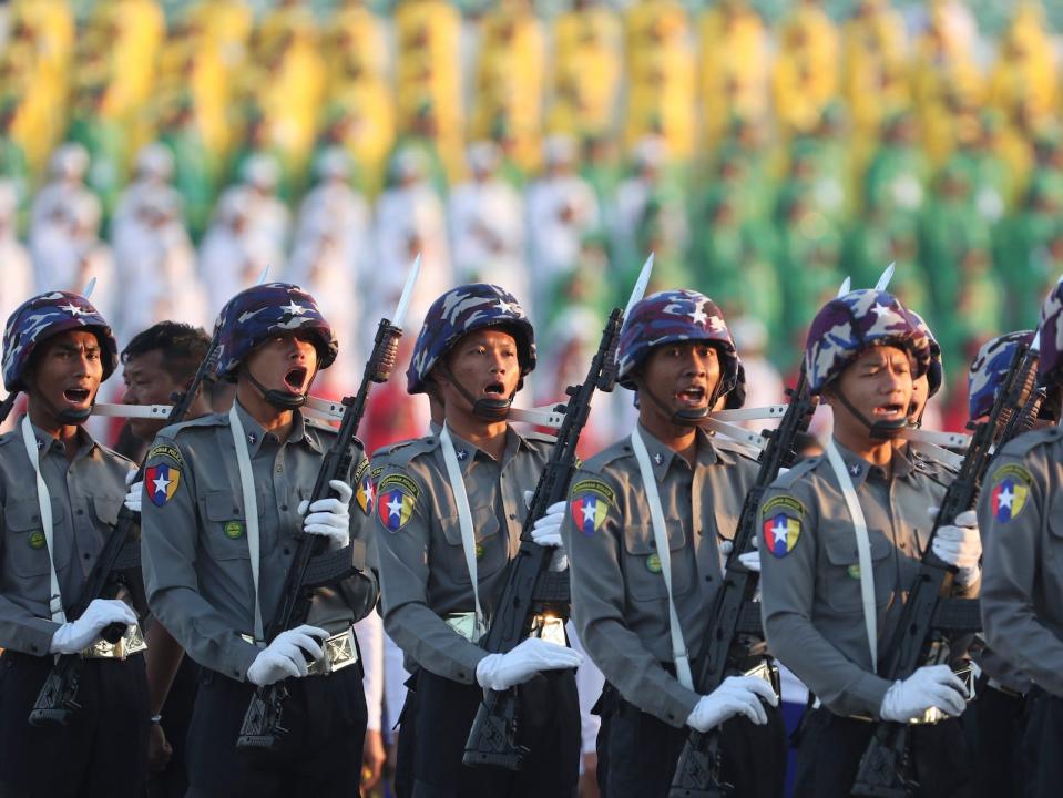 Police march during a ceremony marking Myanmar's 75th anniversary of Independence Day in Naypyitaw, Myanmar, Wednesday, Jan. 4, 2023.