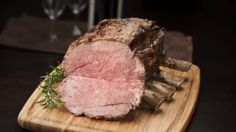 cooked prime rib on board