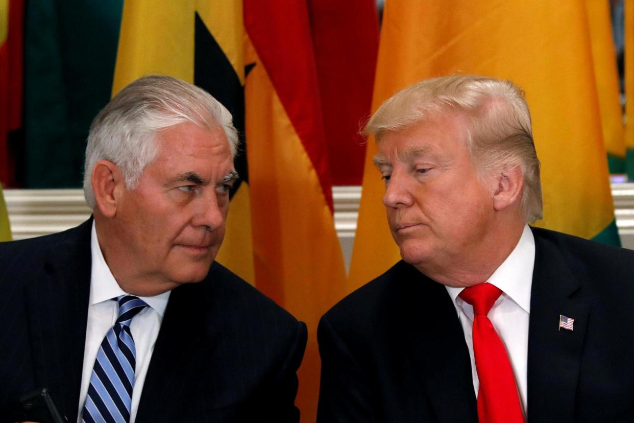 US Secretary of State Rex Tillerson and President Donald Trump confer during a working lunch with African leaders during the UN General Assembly in September: REUTERS