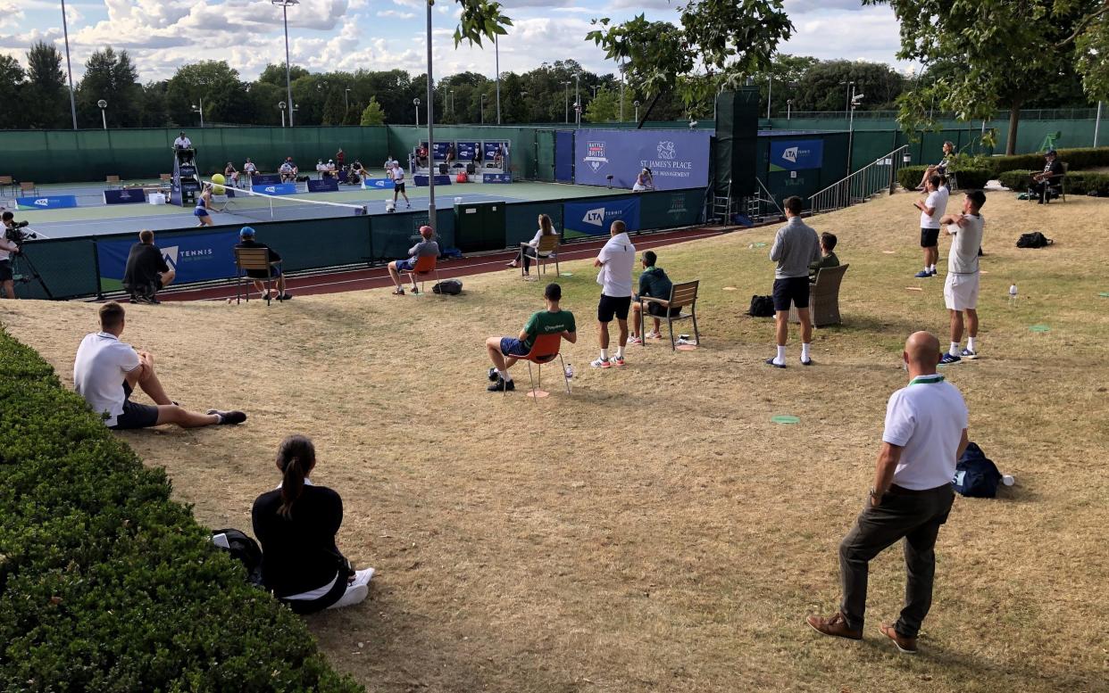 A socially-distanced crowd gathers to watch the Battle of the Brits tennis event in London earlier this month - Julian Finney/Getty Images Europe