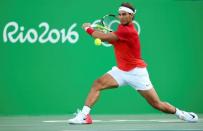 2016 Rio Olympics - Tennis - Quarterfinal - Men's Singles Quarterfinals - Olympic Tennis Centre - Rio de Janeiro, Brazil - 12/08/2016. Rafael Nadal (ESP) of Spain in action against Thomaz Bellucci (BRA) of Brazil. REUTERS/Kevin Lamarque