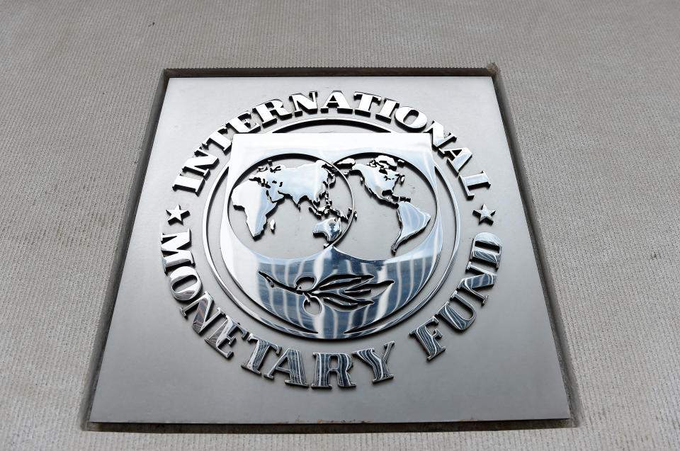 An exterior view of the building of the International Monetary Fund (IMF), with the IMG logo, is seen on March 27, 2020 in Washington, DC. - The coronavirus pandemic has driven the global economy into a downturn that will require massive funding to help developing nations, IMF chief Kristalina Georgieva said on March 27, 2020. Photo: OLIVIER DOULIERY/AFP via Getty Images