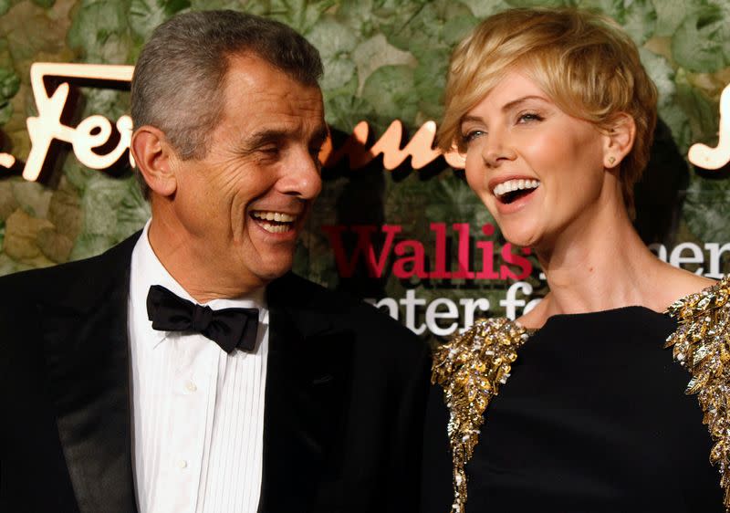 FILE PHOTO: Ferragamo, president of Salvatore Ferragamo, talks with actress Theron at the Wallis Annenberg Center for the Performing Arts Inaugural Gala in Beverly Hills