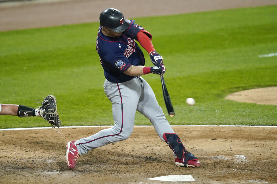 Minnesota Twins' Ryan Jeffers grounds out to Chicago White Sox second baseman Nick Madrigal, scoring Byron Buxton during the fifth inning of a baseball game Tuesday, Sept. 15, 2020, in Chicago. (AP Photo/Charles Rex Arbogast)