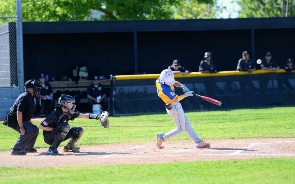 Turlock’s Josh Ramirez makes contact with a pitch during a CCAL matchup with Enochs at Enochs High School in Modesto, Calif. on Friday, April 19, 2024.