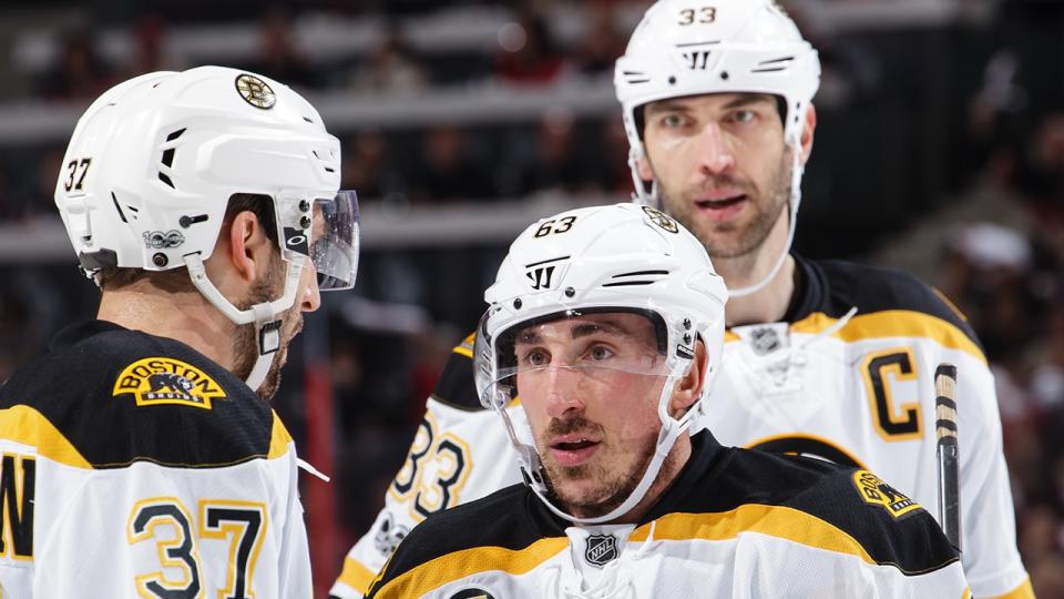 <p>Teammates Brad Marchand #63, Patrice Bergeron #37 and Zdeno Chara #33 of the Boston Bruins chat during a stoppage in play. (Photo by Jana Chytilova/Freestyle Photography/Getty Images)</p>