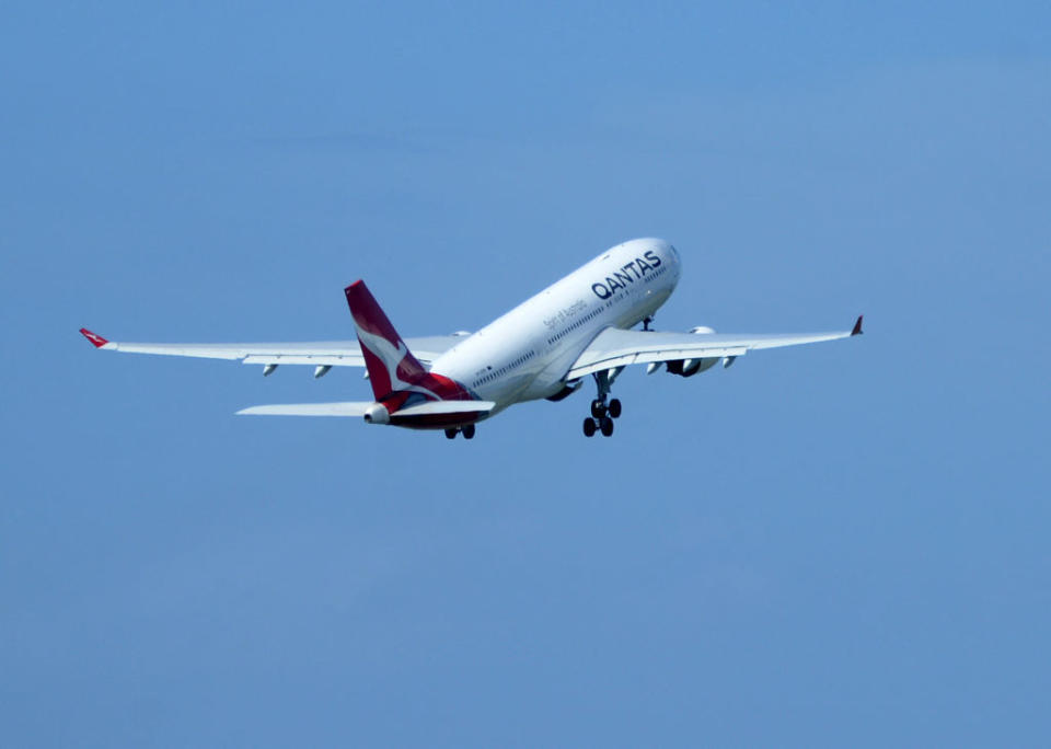 A Qantas airline plane takes off at Ngurah Rai International Airport near Denpasar on the Indonesian resort island of Bali.