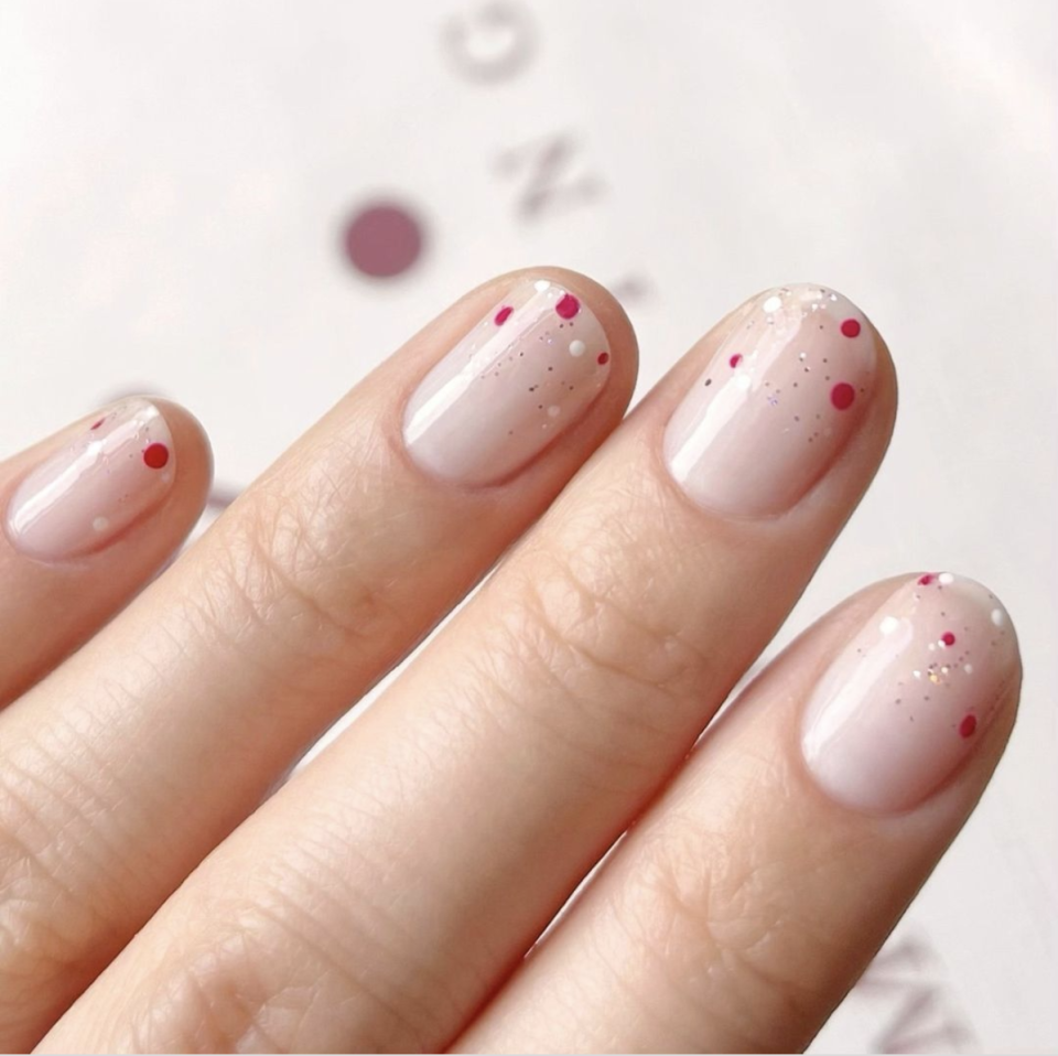 <p>Patriotic nails doesn't <em>always</em> necessarily mean red, white and blue. Channel fireworks with simple, festive dots in any color. Make sure to add some sparkles!</p><p><a class="link " href="https://www.amazon.com/Double-Ended-Dotting-Marbling-Cheeky%C2%AE/dp/B005FJQQMC?tag=syn-yahoo-20&ascsubtag=%5Bartid%7C10055.g.1278%5Bsrc%7Cyahoo-us" rel="nofollow noopener" target="_blank" data-ylk="slk:SHOP DOTTING TOOLS;elm:context_link;itc:0;sec:content-canvas">SHOP DOTTING TOOLS</a></p>