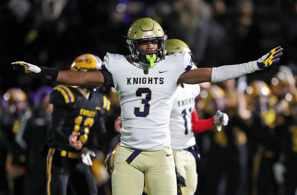 Hoban’s Rickey Williams celebrates after Avon missed a game-tying field goal attempt late in the Division II state semifinal, Friday, Nov. 24, 2023, in Parma.