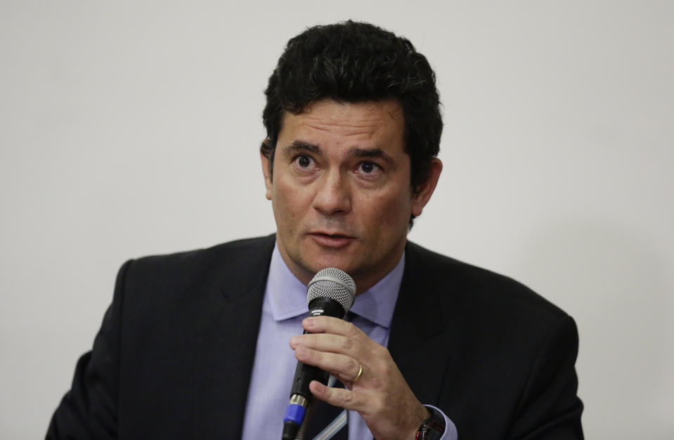 Brazil's Justice Minister Sergio Moro gives a press conference to announce his resignation in Brasilia, Brazil, Friday, April 24, 2020. Moro made the announcement after Brazilian President Jair Bolsonaro changed the head of the country's federal police. (AP Photo/Eraldo Peres)