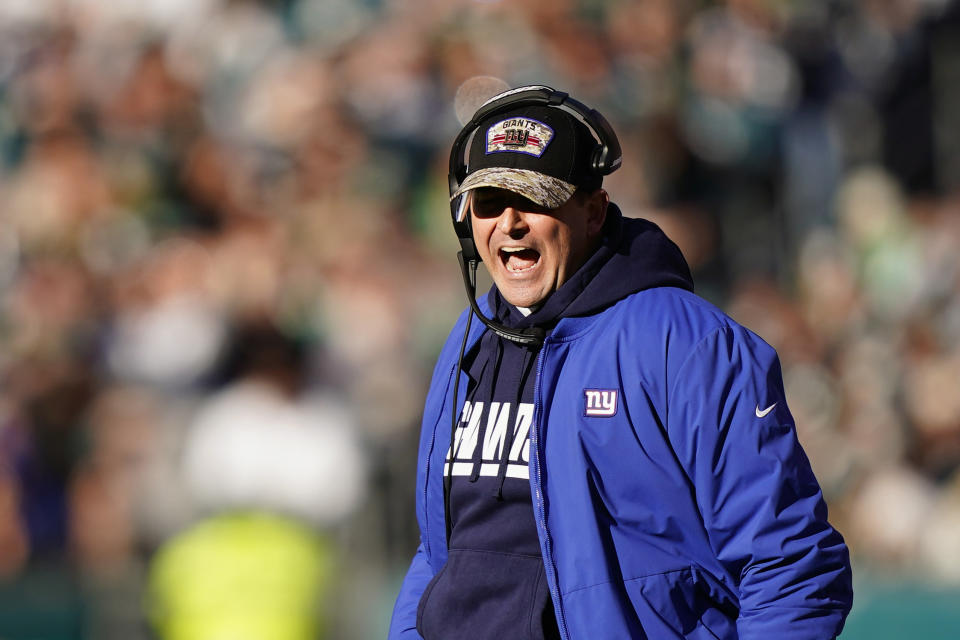 New York Giants' Joe Judge yells during the first half of an NFL football game against the Philadelphia Eagles, Sunday, Dec. 26, 2021, in Philadelphia. (AP Photo/Matt Rourke)