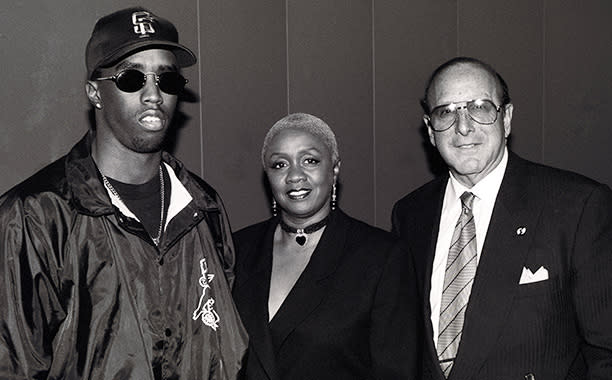 Sean "Puffy" Combs With Clive Davis and His Mother Janice Combs on September 29, 1993