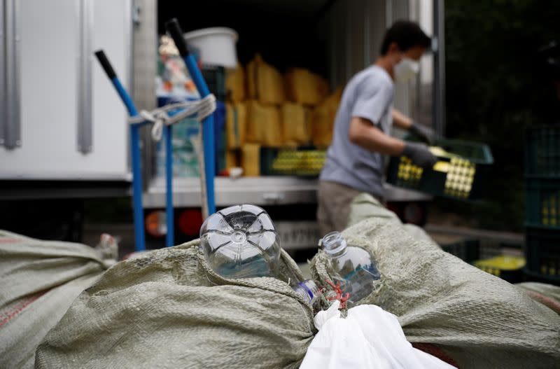 North Korean defector group prepares plastic bottles filled with rice and masks to be sent towards North Korea