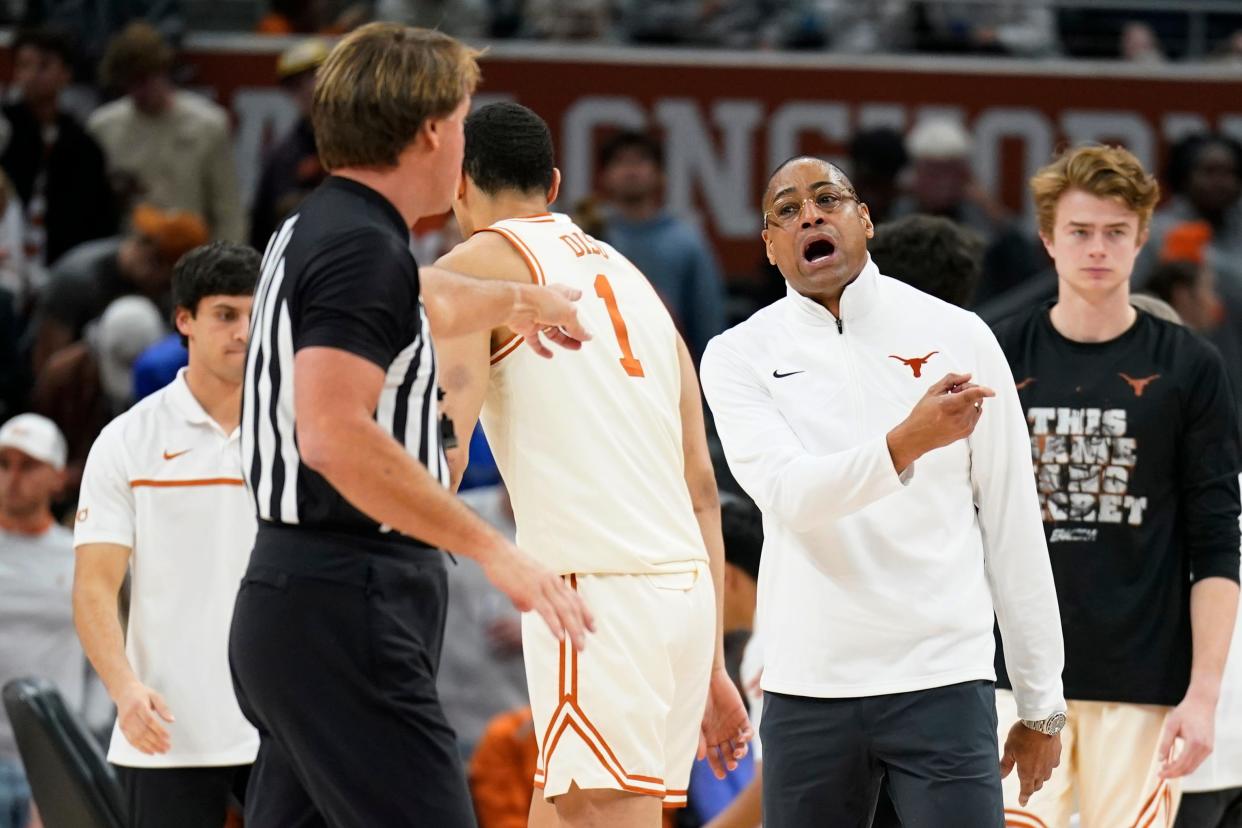 Texas coach Rodney Terry talks with an official during the second half of a Jan. 30 game against Baylor in Austin, Texas. On Monday, the Longhorns will play at Kansas.