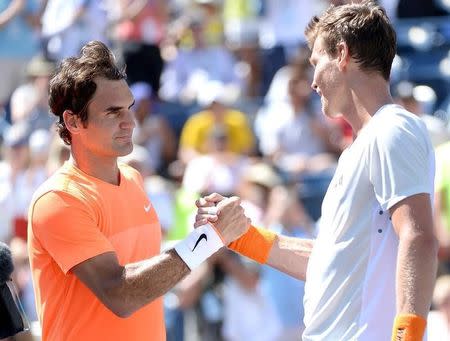 Mar 20, 2015; Indian Wells, CA, USA; Roger Federer (SUI) shakes hands with Tomas Berdych (CZE) after their quarter final match at the Indian Wells Tennis Garden. Federer won 6-4, 6-0. Mandatory Credit: Jayne Kamin-Oncea-USA TODAY