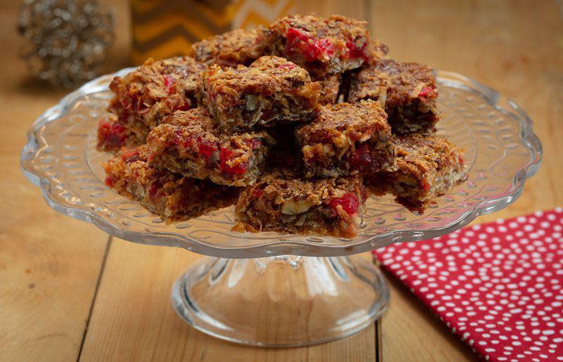 <p>Oat-based bars may not sound thrilling, but with the addition of maraschino cherries, chopped nuts and shredded coconut, these treats certainly are.</p> <p><a href="https://www.thedailymeal.com/recipe/cherry-bars-recipe?referrer=yahoo&category=beauty_food&include_utm=1&utm_medium=referral&utm_source=yahoo&utm_campaign=feed" rel="nofollow noopener" target="_blank" data-ylk="slk:For the Cherry Bars recipe, click here.;elm:context_link;itc:0;sec:content-canvas" class="link ">For the Cherry Bars recipe, click here.</a></p>