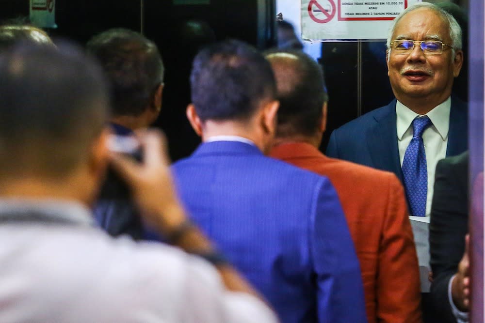 Datuk Seri Najib Razak is seen at the Kuala Lumpur Court Complex July 9, 2019. — Picture by Hari Anggara