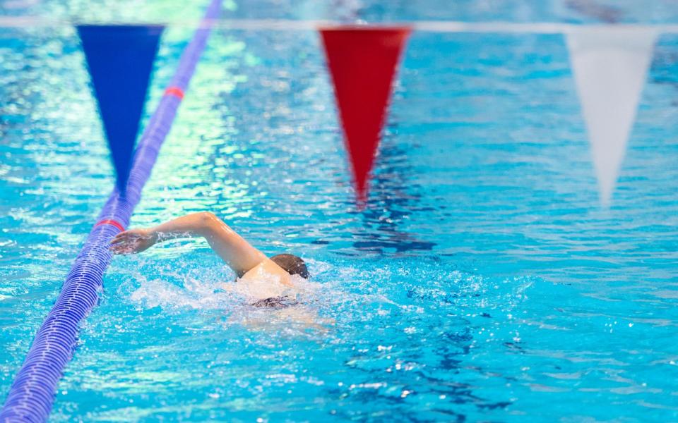 Swimmers at the London Aquatic Centre, at the Queen Elizabeth Olympic Park, London, which is re-opening as indoor gyms, swimming pools and sports facilities  - PA