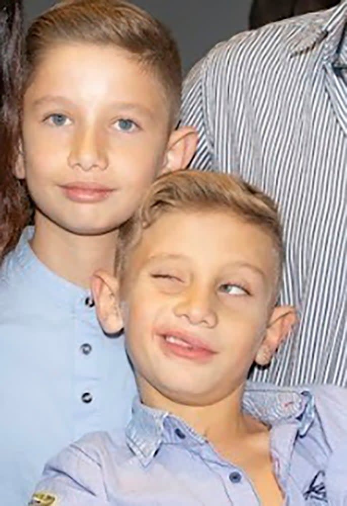 Brothers Yagil Yaakov, 12, and Or Yaakov, 16 (AP)