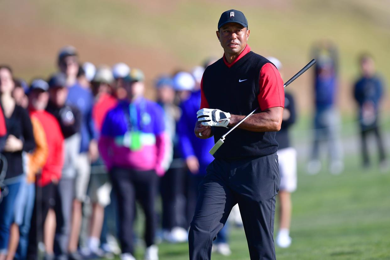 Feb 19, 2023; Pacific Palisades, California, USA; Tiger Woods walks to the third hole green during the final round of The Genesis Invitational golf tournament. Mandatory Credit: Gary A. Vasquez-USA TODAY Sports