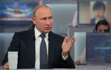 Russian President Vladimir Putin speaks during a live nationwide broadcast call-in in Moscow, Russia June 7, 2018. Sputnik/Mikhail Klimentyev/Kremlin via REUTERS