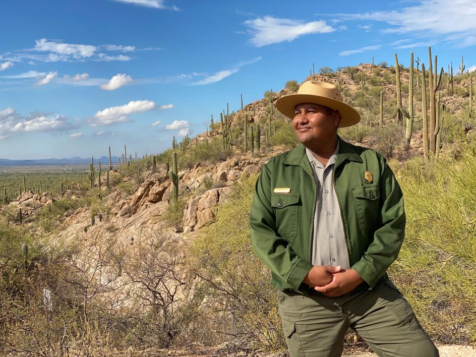 Raeshaun Ramon, a ranger at Saguaro National Park in Arizona, initially feared he would be judged for donning the green-and-gray uniform of a US National Park Service ranger. "I was afraid of what my people might think of me," the Tohono O'odham Nation member said. "Why work for a place that has done us so much harm in the past?"