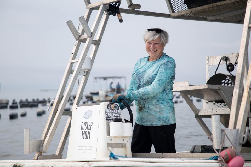 OysterMom Deborah Keller drives her boat in Oyster Bay in Crawfordville Wednesday, June 16, 2021.