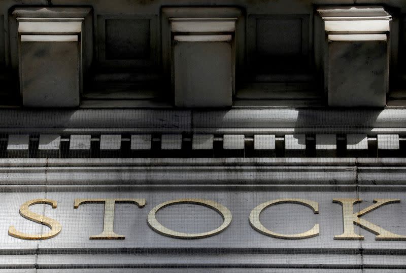 FILE PHOTO: Morning sunlight falls on the facade of the New York Stock Exchange (NYSE) building in Manhattan in New York City, New York, U.S., January 28, 2021.