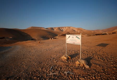 School sign is seen in Jordan Valley in the Israeli-occupied West Bank