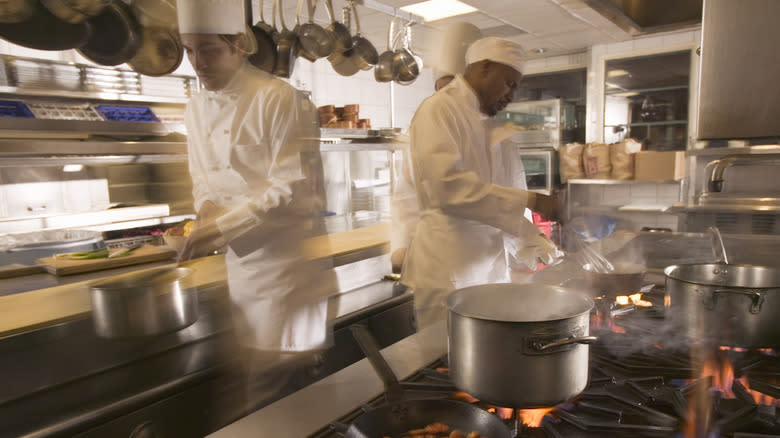 restaurant chefs at different stations