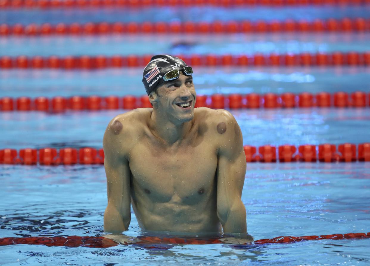 2016 Rio Olympics - Swimming - Final - Men's 200m Butterfly Final - Olympic Aquatics Stadium - Rio de Janeiro, Brazil - 09/08/2016. Michael Phelps (USA) of USA reacts after winning the gold medal.     REUTERS/Stefan Wermuth TPX IMAGES OF THE DAY FOR EDITORIAL USE ONLY. NOT FOR SALE FOR MARKETING OR ADVERTISING CAMPAIGNS.   - RIOEC8A04U9V0