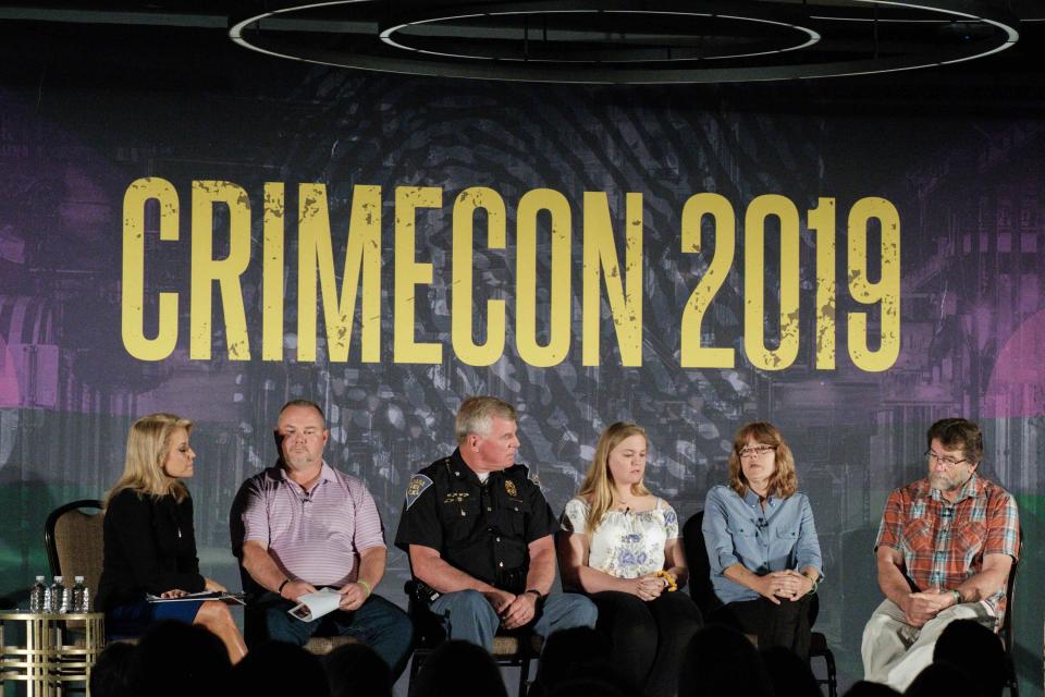 HLN’s Susan Hendricks moderates a panel with Mike Patty, Indiana State Police Sgt. Kim Riley, Kelsi German, and Diane and Eric Erskin at CrimeCon in June 2019.