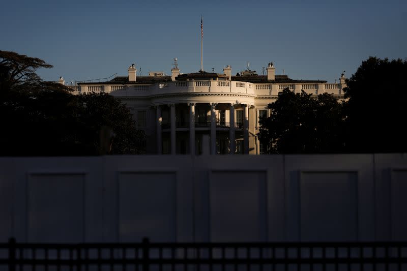 The White House is seen at sunrise from Ellipse Park in Washington