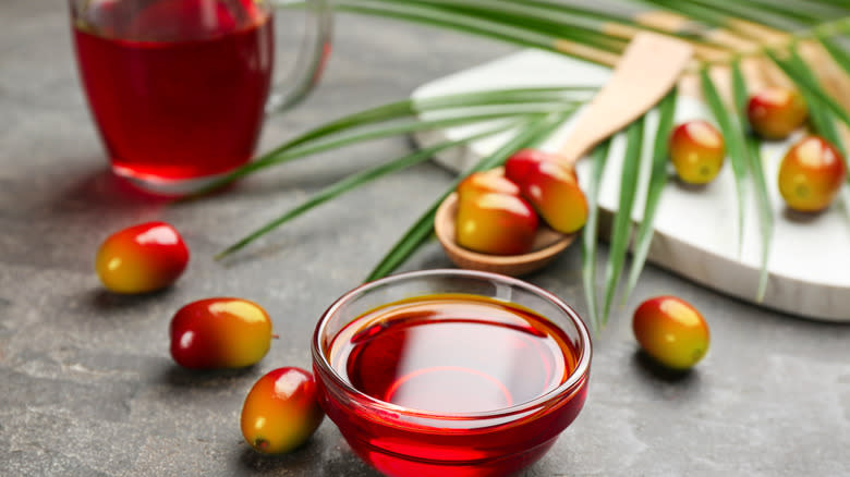 glass bowl with red palm oil