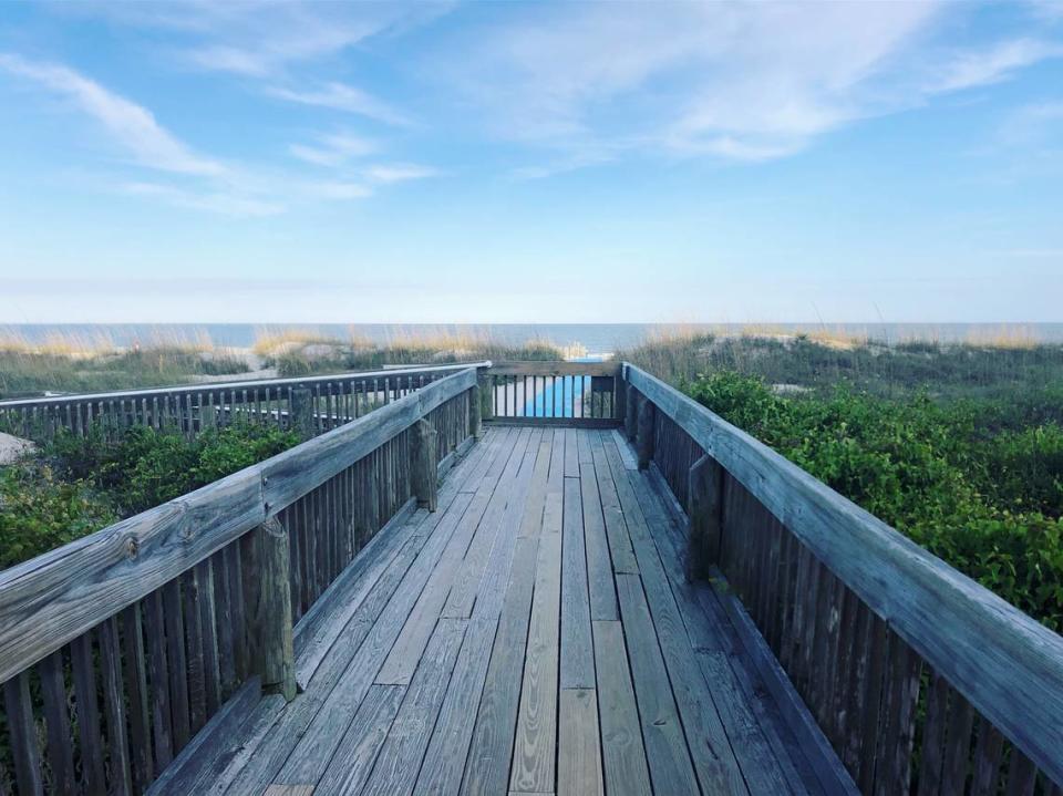 The view of the boardwalk and ocean at Folly Field Beach Park on Hilton Head Island.