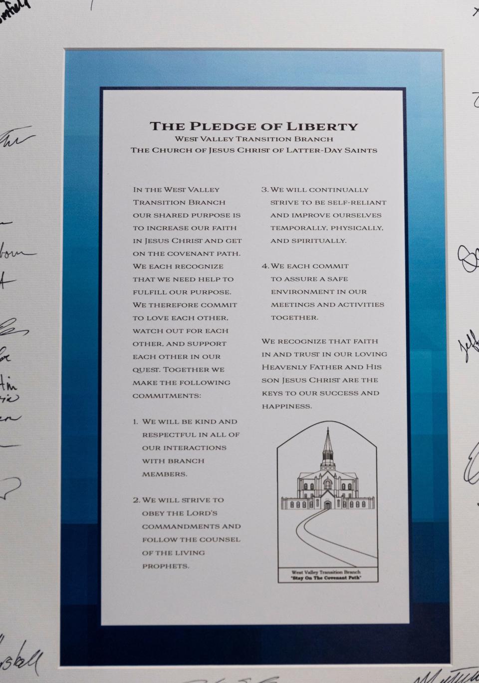 A statement is displayed, signed by community members and former prison inmates, during a sacrament service at The Church of Jesus Christ of Latter-day Saints in West Valley City on Sunday, Jan. 28, 2024. | Marielle Scott, Deseret News