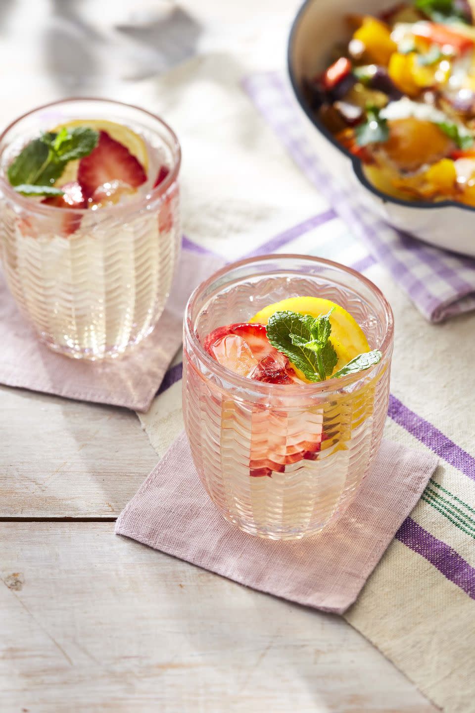 <p>It's just not brunch without a refreshing drink. This simple herbal tea is kid-friendly, and grown-up fancy.</p><p><strong><a href="https://www.countryliving.com/food-drinks/a35685014/fresh-mint-and-lemon-iced-tea-recipe/" rel="nofollow noopener" target="_blank" data-ylk="slk:Get the recipe for Fresh Mint and Lemon Iced Tea;elm:context_link;itc:0;sec:content-canvas" class="link ">Get the recipe for Fresh Mint and Lemon Iced Tea</a>.</strong> </p>