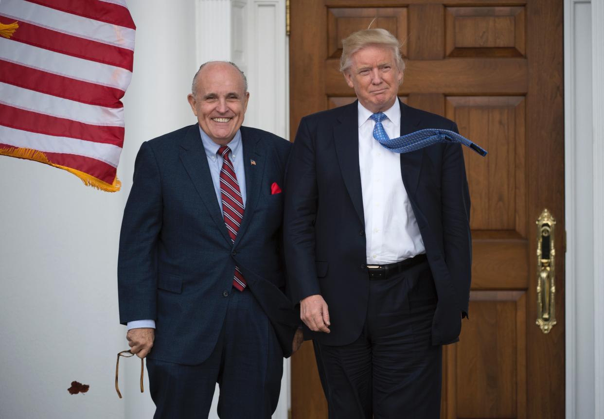 Rudy Giuliani and&nbsp;Donald Trump at&nbsp;the Trump National Golf Club&nbsp;in November 2016. (Photo: DON EMMERT via Getty Images)