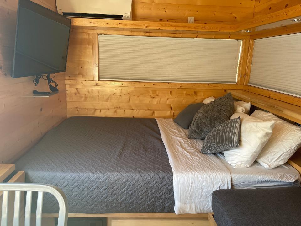bed facing TV in tiny home airbnb near disneyland