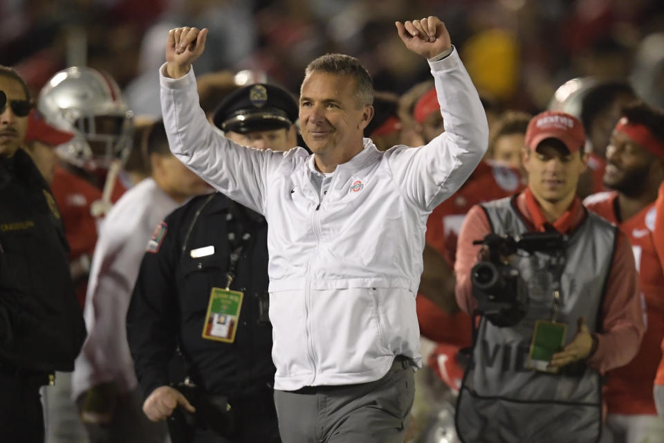 Ohio State coach Urban Meyer celebrates at the end of the team's 28-23 win over Washington at the Rose Bowl. (AP)