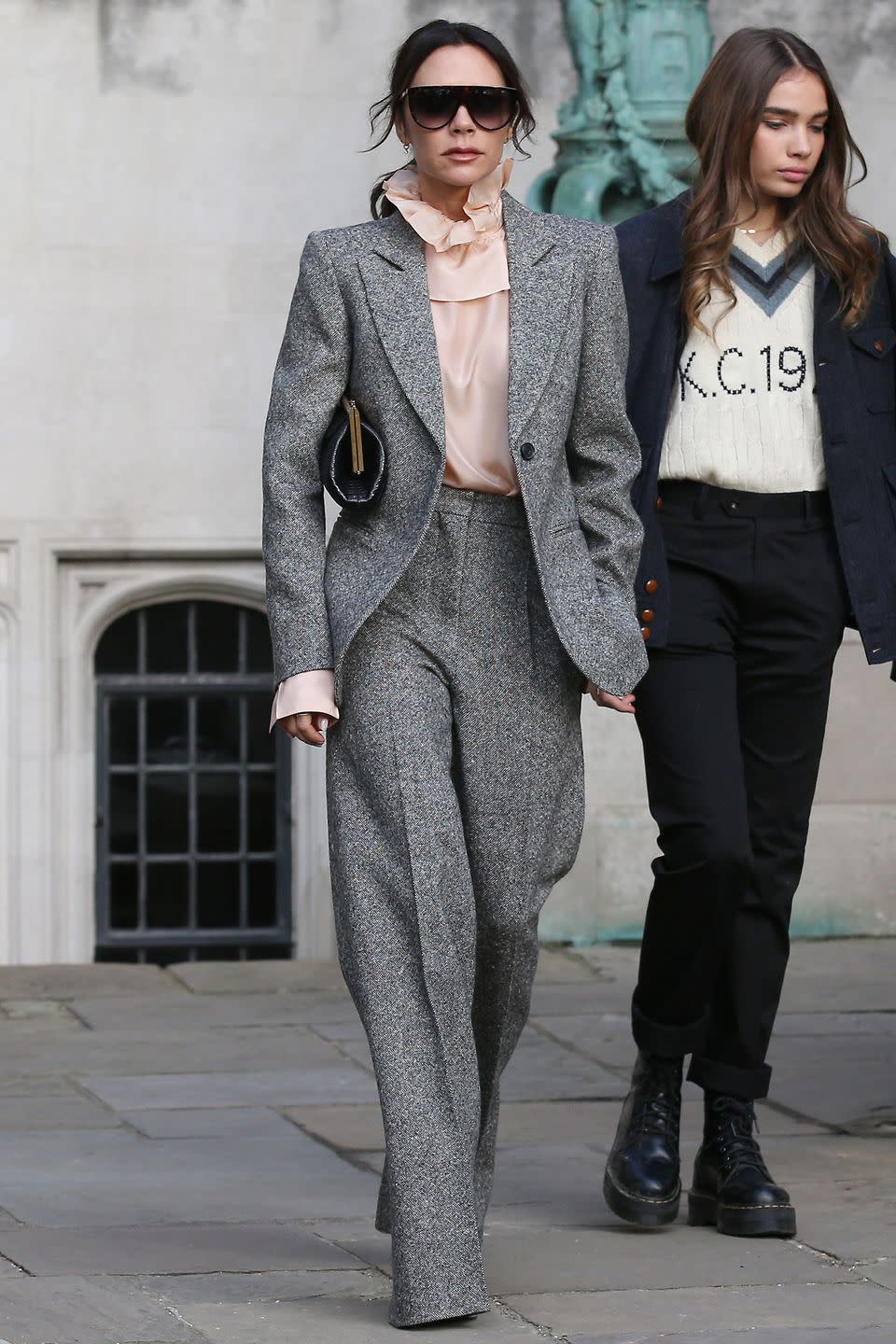 <p><strong>January 2019</strong> Victoria Beckham wore a wide-leg tweed suit with a sheer ruffled shirt to attend the menswear shows in London.</p>