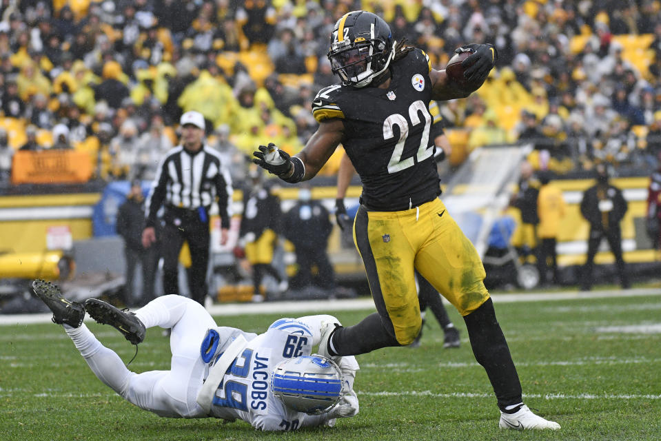 Pittsburgh Steelers running back Najee Harris (22) slips a tackle attempted by Detroit Lions cornerback Jerry Jacobs (39) during the second half of an NFL football game in Pittsburgh, Sunday, Nov. 14, 2021. (AP Photo/Don Wright)