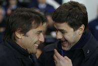 <p>Chelsea’s manager Antonio Conte, left, and Tottenham’s manager Mauricio Pochettino smile together ahead of the English Premier League soccer match between Tottenham Hotspur and Chelsea at White Hart Lane stadium in London, Wednesday, Jan. 4, 2017. (AP Photo/Alastair Grant) </p>