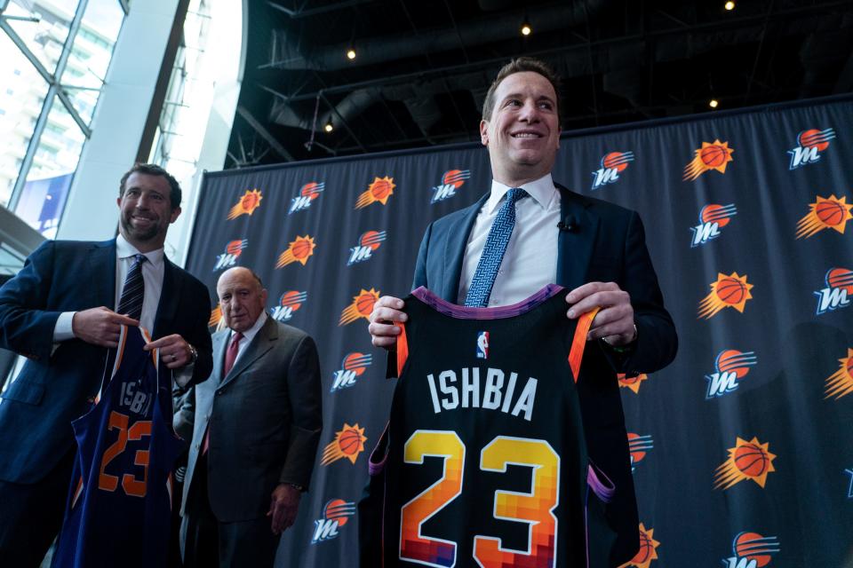Mat Ishbia (right) attends a news conference introducing him as the new majority owner of the Suns and Mercury at Footprint Center in Phoenix on Feb. 8, 2023.