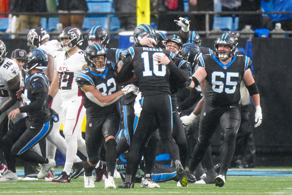 Carolina Panthers place-kicker Eddy Pineiro (4) celebrates after kicking the game winning field goal against the Atlanta Falcons during an NFL football game Sunday, Dec. 17, 2023, in Charlotte, N.C. (AP Photo/Jacob Kupferman)