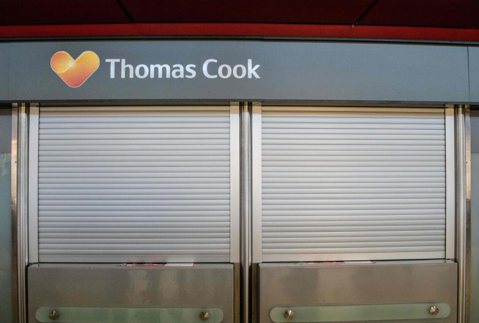 The service desk of British tour operator Thomas Cook is closed at Tegel airport in Berlin on September 23, 2019. - As British tour operator Thomas Cook declared bankruptcy, some 600,000 tourists from around Europe had their holidays disrupted. (Photo by Paul Zinken / dpa / AFP) / Germany OUT        (Photo credit should read PAUL ZINKEN/AFP/Getty Images)