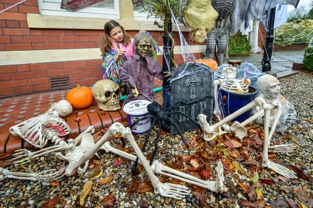 Rosie Hargreaves with some of the decorations (Ben Birchall/PA)