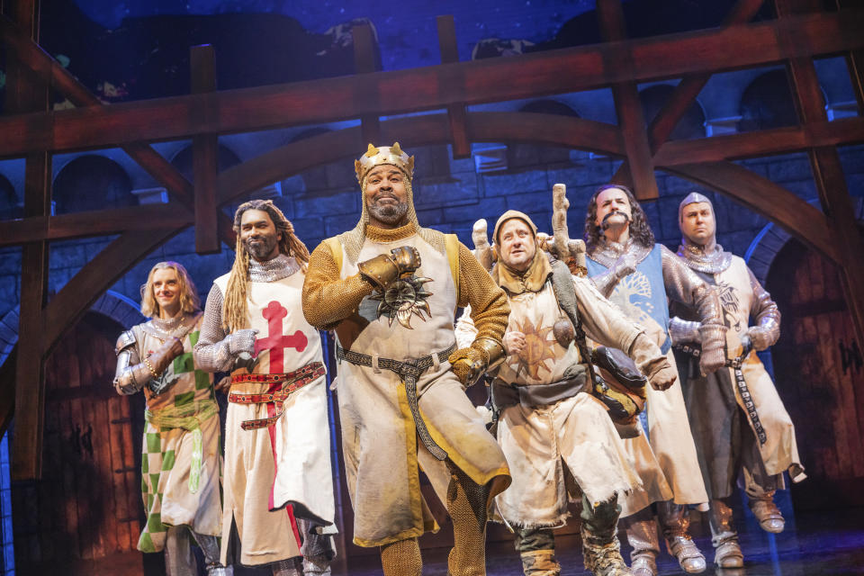 This image released by Polk & Co. shows the cast of "Spamalot," from left, Michael Urie, Nik Walker, James Monroe Iglehart, Christopher Fitzgerald, Jimmy Smagula and Taran Killam during a performance in New York. (Matthew Murphy/Polk & Co. via AP)