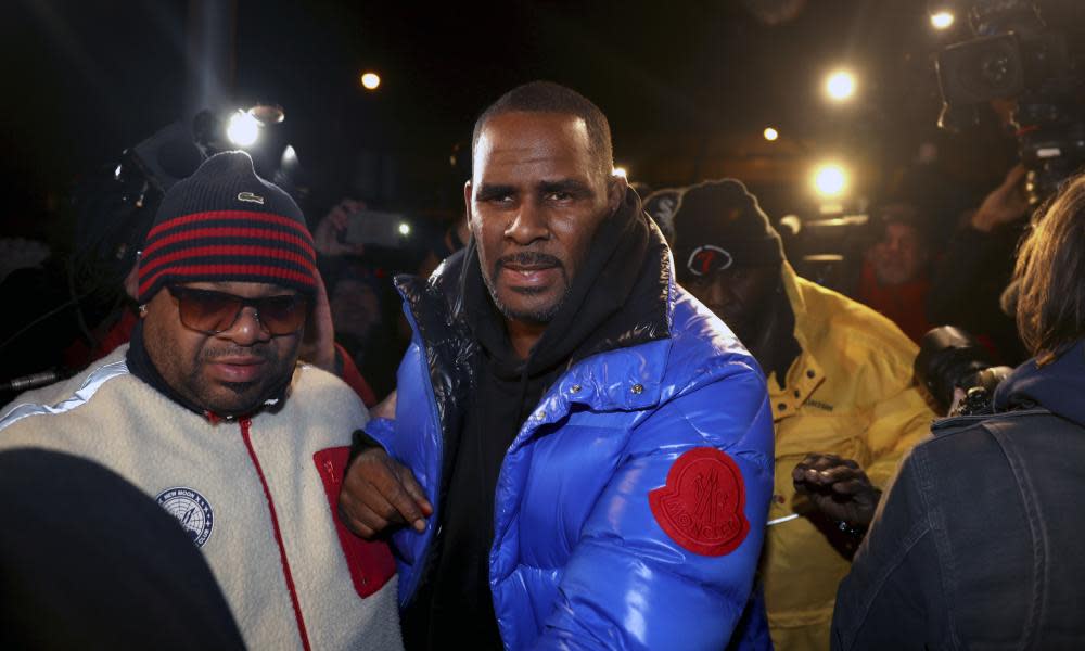 Singer R Kelly is in police custody in Chicago.