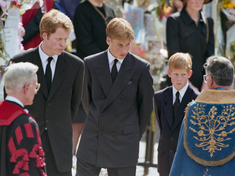 Charles Spencer, Prince William, and Prince Harry, attending Princess Diana's funeral service at Westminster Abbey on September 6, 1997.